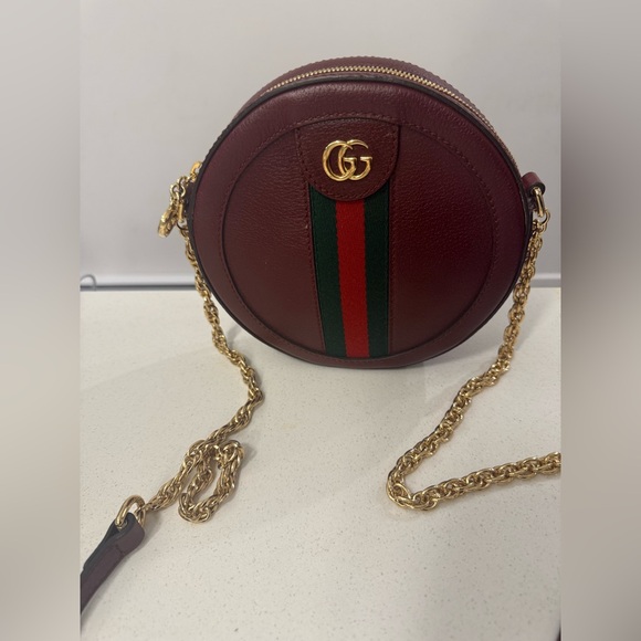 Gucci Handbags - Gucci Burgundy Round Crossbody Bag with Gold Chain
